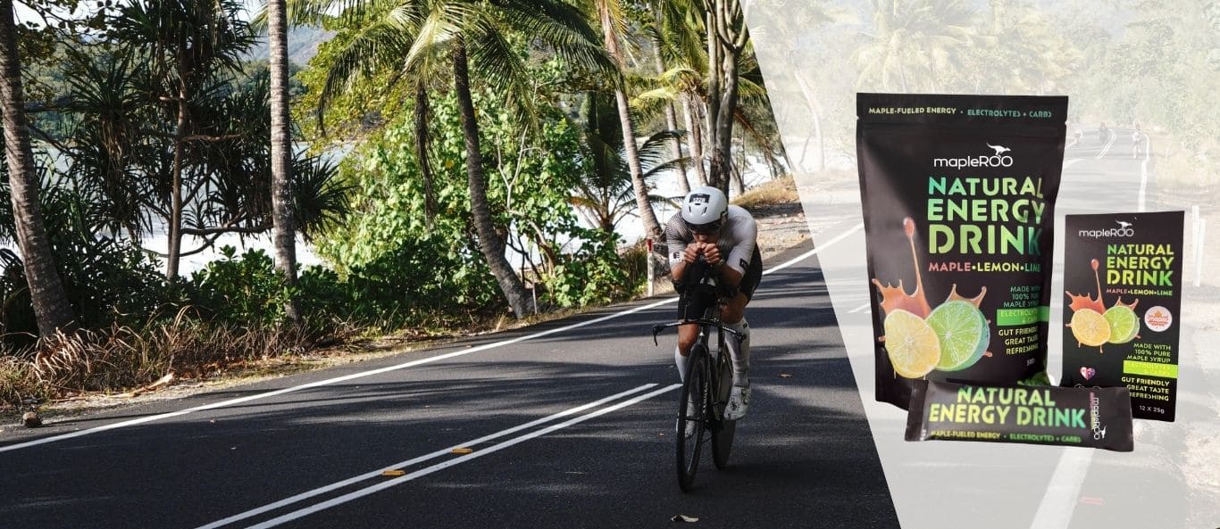 A cyclist during a race fuelling with mapleROO Natural Energy and Electrolytes Drink mix made with pure maple syrup (organic) refreshing and carbs.